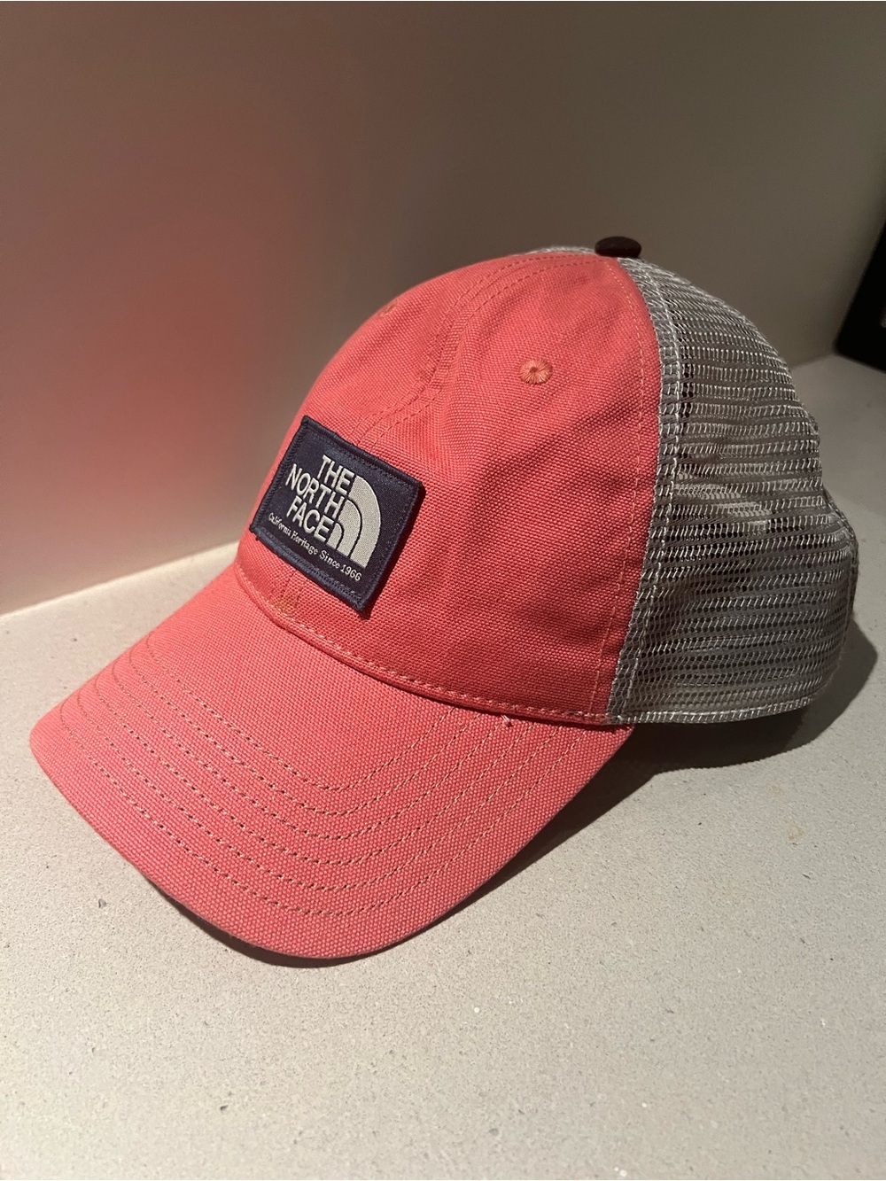 The North Face women’s Coral Trucker Hat with Gray Mesh